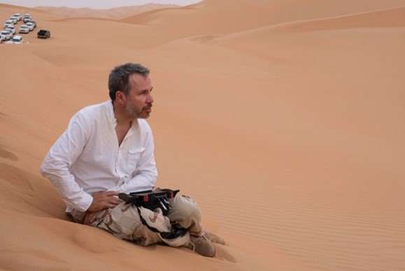Denis Villeneuve in the Liwa desert while filming Dune. Photo: Chiabella James